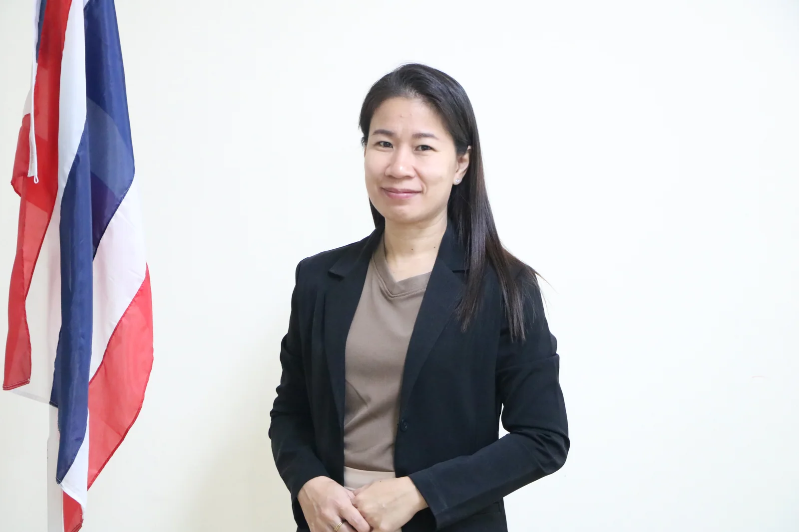 Ms. Sriploy Wongsung — School Principal